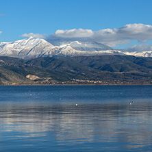 Amazing winter Landscape of Lake Pamvotida and Pindus mountain from city of Ioannina, Epirus, Greece