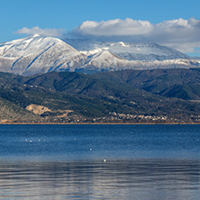 Amazing winter Landscape of Lake Pamvotida and Pindus mountain from city of Ioannina, Epirus, Greece