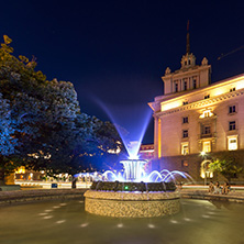 SOFIA, BULGARIA - JULY 21, 2017: Night photo of Fountain in front of The Building of the Presidency and Former Communist Party House in Sofia, Bulgaria