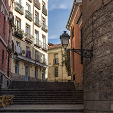 MADRID, SPAIN - JANUARY 23, 2018: Facade of typical Buildings and streets in City of Madrid, Spain