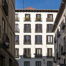 MADRID, SPAIN - JANUARY 23, 2018: Facade of typical Buildings and streets in City of Madrid, Spain