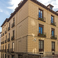 MADRID, SPAIN - JANUARY 23, 2018: Facade of typical Buildings and streets in City of Madrid, Spain