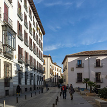 MADRID, SPAIN - JANUARY 23, 2018: Facade of typical Buildings and streets in City of Madrid, Spain