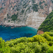 Blue water and rocks of beach at Zakynthos island, Greece