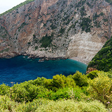 Blue water and rocks of beach at Zakynthos island, Greece