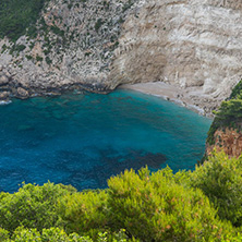 Blue water and rocks of beach at Zakynthos island, Greece