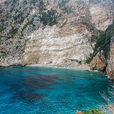 Blue water and rocks of beach at Zakynthos island, Greece