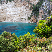 Blue water and rocks of beach at Zakynthos island, Greece