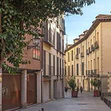 MADRID, SPAIN - JANUARY 23, 2018: Facade of typical Buildings and streets in City of Madrid, Spain