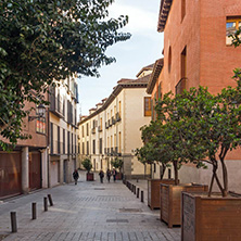 MADRID, SPAIN - JANUARY 23, 2018: Facade of typical Buildings and streets in City of Madrid, Spain