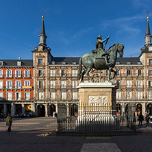 MADRID, SPAIN - JANUARY 23, 2018:  Tourist visiting Plaza Mayor in city of Madrid, Spain