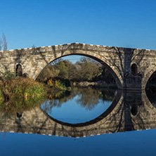 Autumn view of Kadin most - a 15th-century stone arch bridge over the Struma River at Nevestino, Kyustendil Province, Bulgaria