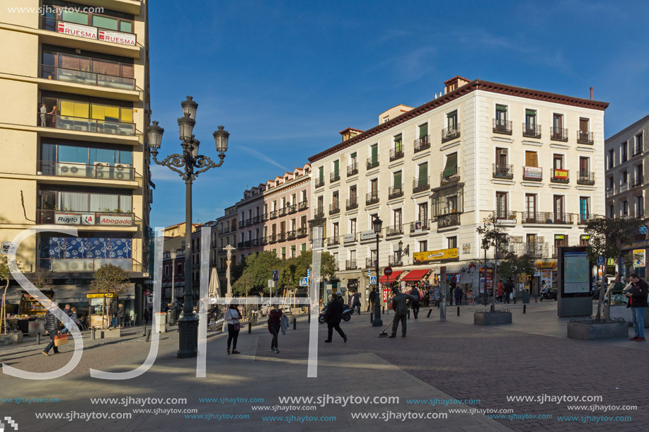 MADRID, SPAIN - JANUARY 23, 2018: Tourist visiting  Plaza de Jacinto Benavente in City of Madrid, Spain