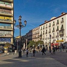 MADRID, SPAIN - JANUARY 23, 2018: Tourist visiting  Plaza de Jacinto Benavente in City of Madrid, Spain