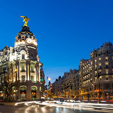 MADRID, SPAIN - JANUARY 23, 2018:  Sunset view of Gran Via and Metropolis Building (Edificio Metropolis) in City of Madrid, Spain