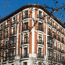 MADRID, SPAIN - JANUARY 24, 2018: Facade of typical Buildings and streets in City of Madrid, Spain