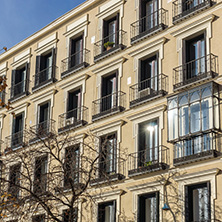 MADRID, SPAIN - JANUARY 24, 2018: Facade of typical Buildings and streets in City of Madrid, Spain